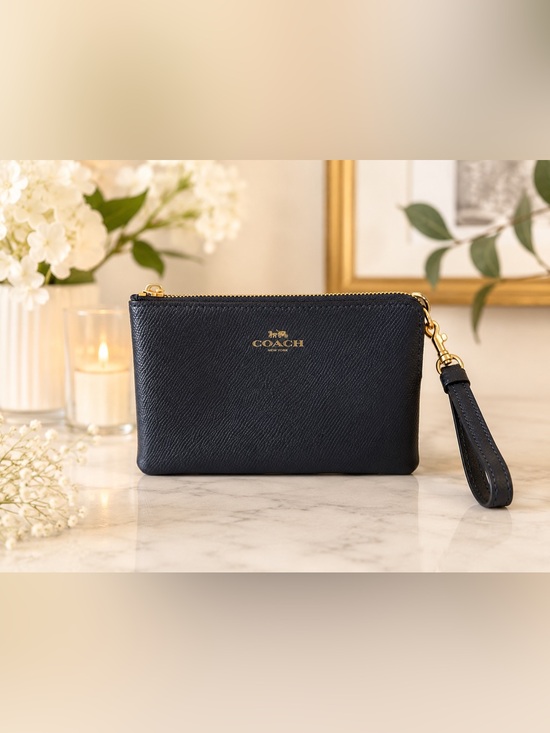 Coach Handbags - Coach Navy Zip Wristlet with Gold Hardware